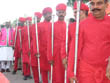 jaipur travel | porters of goddess teej's palanquin in teej fair.  All are having silver poles in their hands.